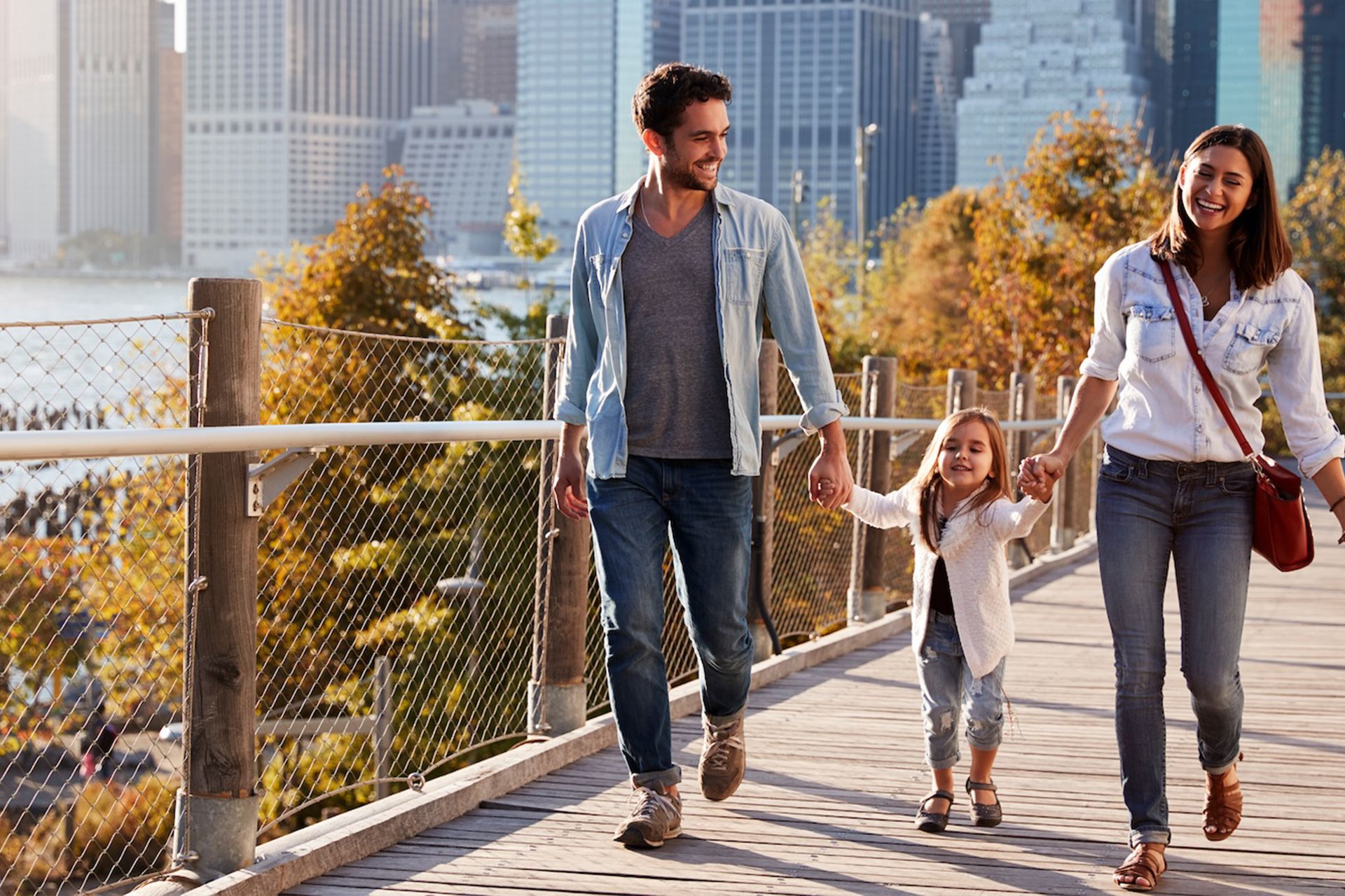 Family taking a walk down the street, close up