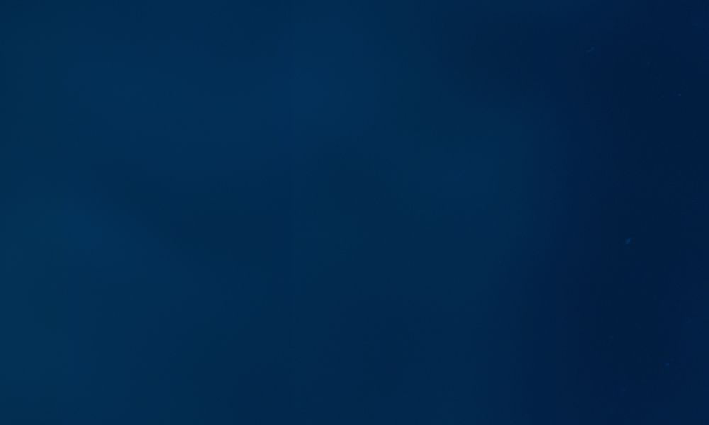 Solid dark blue background, suitable for design projects or as a plain backdrop.